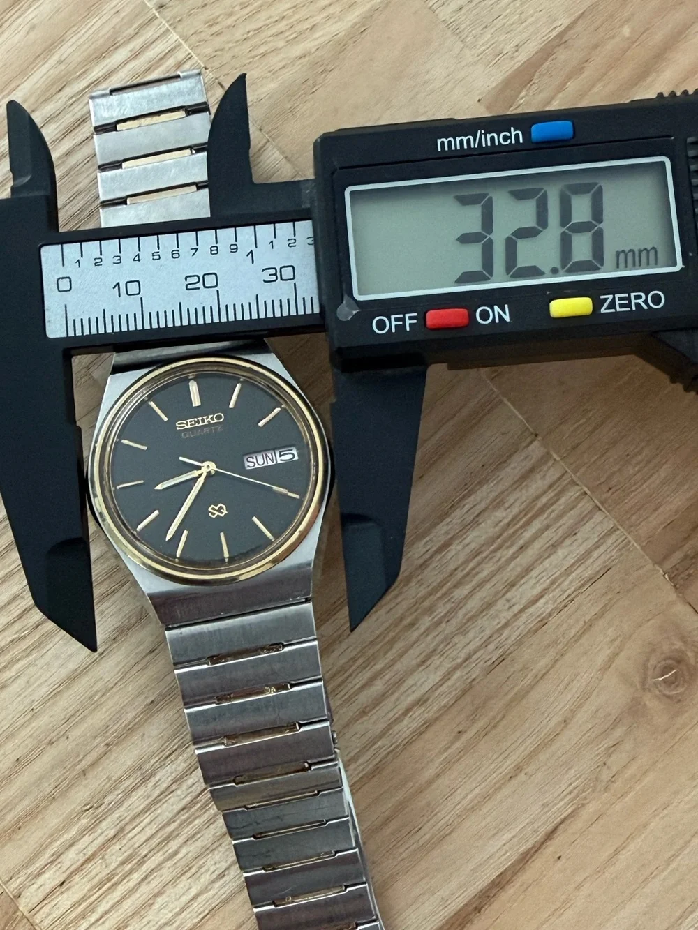 Seiko SQ Vintage Watch Gold Plated Bezel and Bracelet Black Dial Date Window